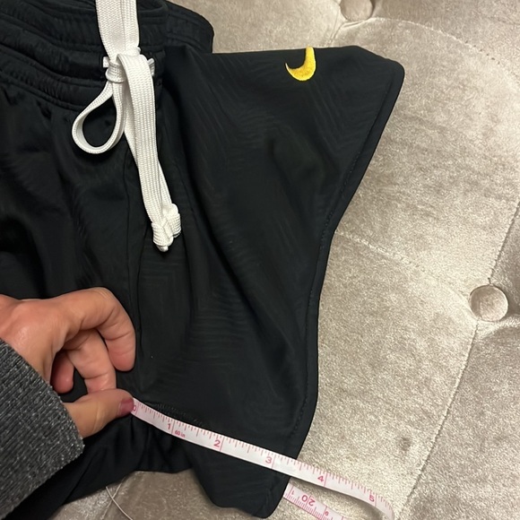 Nike dry fit shorts in black and gold. Live strong logo. - Picture 8 of 10